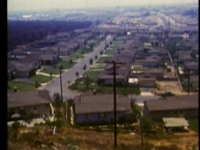 People_Visit_New_Houses_in_the_Suburbs_ca__1950s